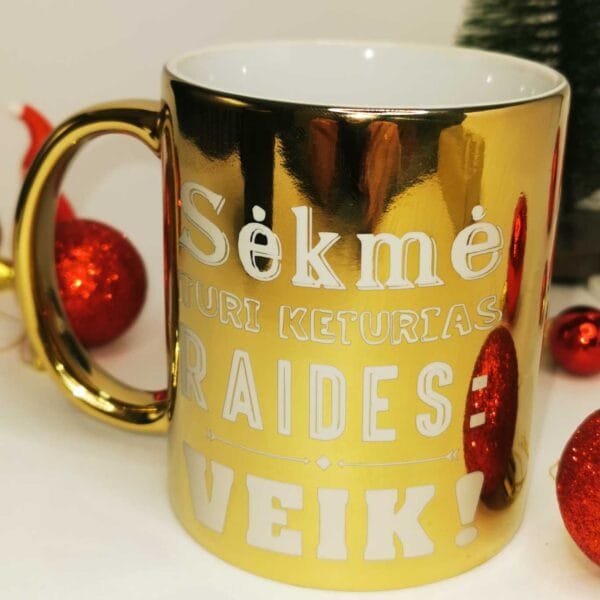 Puodelis Aukso spalvos sėkmė turi keturias raides